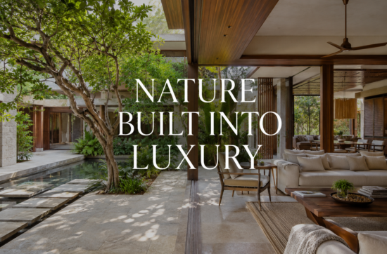 Biophilic design in a luxury Indian home with courtyard, natural light, garden views, stone, wood, and indoor-outdoor living.