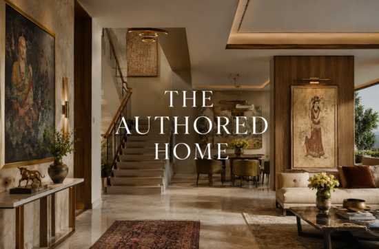Art placement in a luxury Indian home with wall architecture, layered lighting, natural stone, custom furniture, and curated artwork.